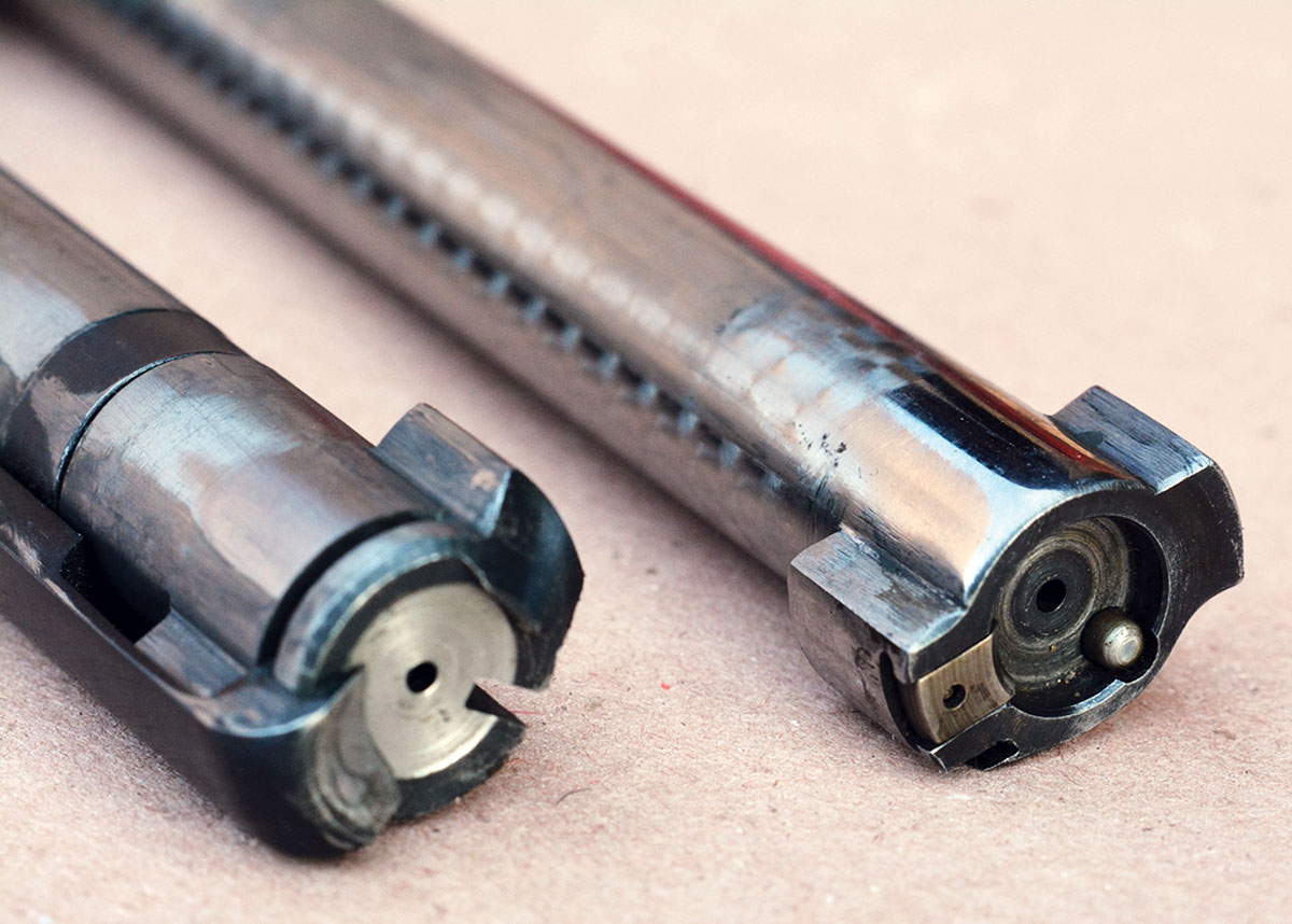 The pre-’64 Model 70 bolt (left) was machined from solid steel and featured a powerful claw extractor. The post-’64 Model 70 bolt (right) was two-piece and featured a counter-bored bolt face with a rotating extractor and plunger ejector.